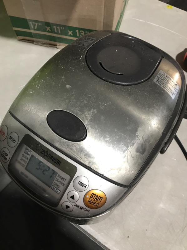 Photo 3 of * item powers on * item used * dirty *
Zojirushi NS-TSC10 5-1/2-Cup (Uncooked) Micom Rice Cooker and Warmer, 1.0-Liter 5.5 cups Rice Cooker