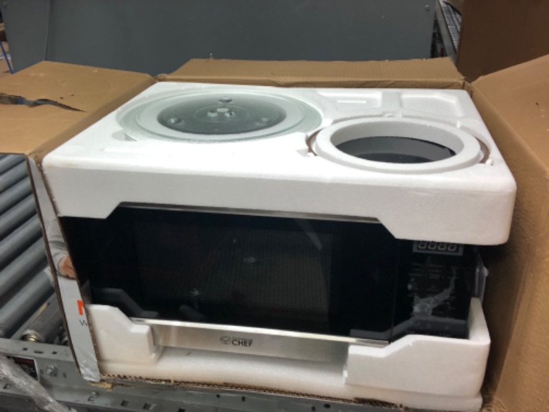 Photo 2 of **POWERS ON***
Commercial Chef 1.1-Cu. Ft. Countertop Microwave - Stainless Steel Front