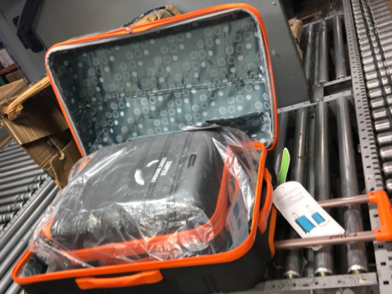 Photo 1 of **2 WHEELS ARE DENTED INWARD BUT FUCNTIONAL**
Rockland Melbourne Hardside Expandable Spinner Wheel Luggage, Charcoal, 2-Piece Set (20/28) 2-Piece Set (20/28) Charcoal
