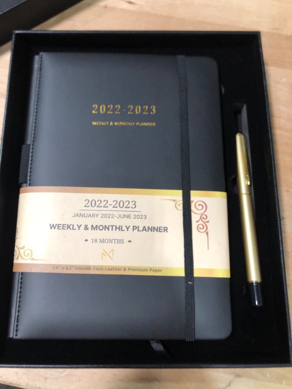 Photo 2 of Modern Mercantile Planner 2022-2023 - 5.8" x 8.3" Jan 2022 - June 2023 Monthly Planner with Weekly and Monthly Planning, Faux Leather Hard Cover, Gold Pen, Book Case, Bookmark and Elastic Band