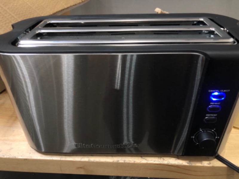 Photo 2 of ***POWERS ON*** Elite Gourmet ECT-3100 Long Slot 4 Slice Toaster, Reheat, 6 Toast Settings, Defrost, Cancel Functions, Built-in Warming Rack, Extra Wide Slots for Bagels & Waffles, Stainless Steel & Black