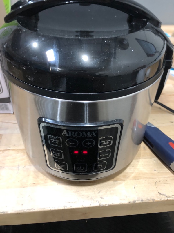 Photo 2 of ***POWERS ON *** Aroma Housewares ARC-914SBD Digital Cool-Touch Rice Grain Cooker and Food Steamer, Stainless, Silver, 4-Cup (Uncooked) / 8-Cup (Cooked) Basic