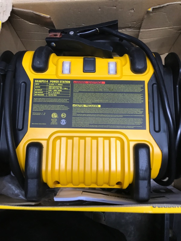 Photo 2 of DEWALT DXAEPS14 1600 Peak Battery Amp 12V Automotive Jump Starter/Power Station with 500 Watt AC Power Inverter, 120 PSI Digital Compressor, and USB Power , Yellow