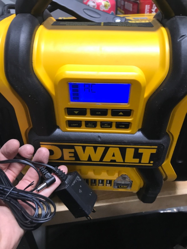 Photo 4 of DEWALT DXAEPS14 1600 Peak Battery Amp 12V Automotive Jump Starter/Power Station with 500 Watt AC Power Inverter, 120 PSI Digital Compressor, and USB Power , Yellow