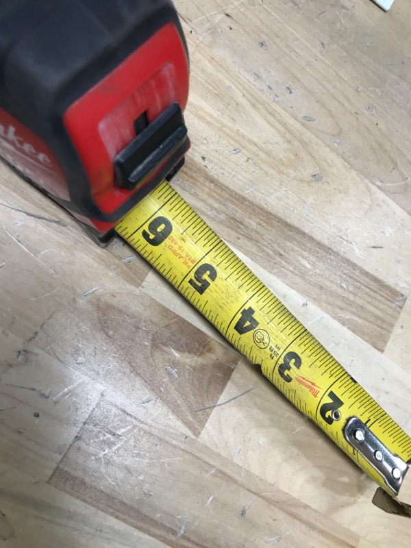 Photo 2 of 25 ft. x 1-5/16 in. Wide Blade Tape Measure with 17 ft. Reach
