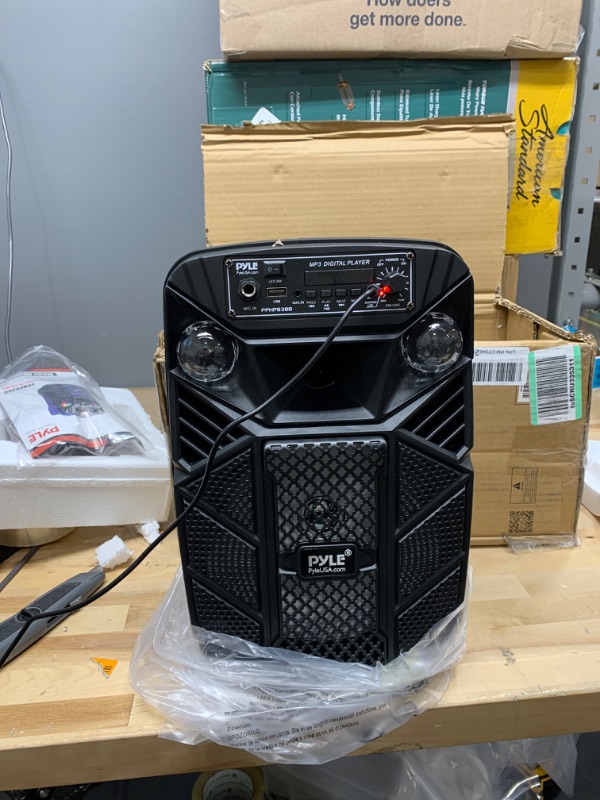 Photo 2 of Portable Bluetooth PA Speaker System - 300W Rechargeable Outdoor Bluetooth Speaker Portable PA System w/ 8” Subwoofer 1” Tweeter, Microphone in, MP3/USB, Radio, Remote - Pyle PPHP838B, Black