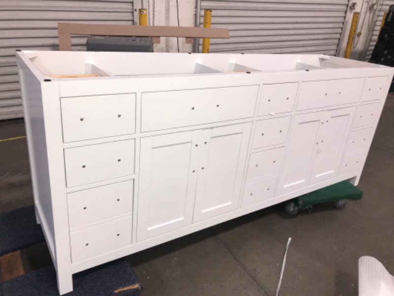 Photo 2 of *DOES NOT COME WITH FTOP PART**MINOR DAMAGE ON LEFT CORNER (SEE LAST IMAGE** Beckett 84 in. W x 22 in. D x 35 in. H Double Sink Bath Vanity in White with Carrara Cultured Marble Top
