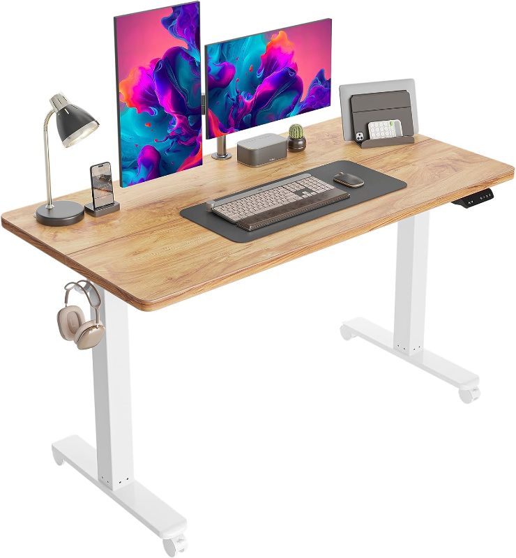 Photo 1 of CubiCubi Electric Standing Desk, 55 x 24 Inches Height Adjustable Sit Stand Desk, Ergonomic Home Office Computer Workstation, Light Rustic Brown
