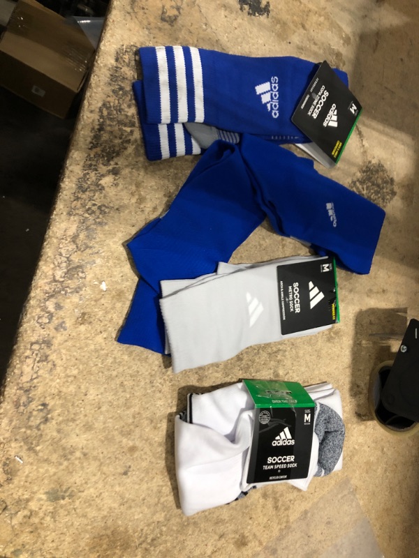 Photo 1 of bundle of 4 adidas socks med