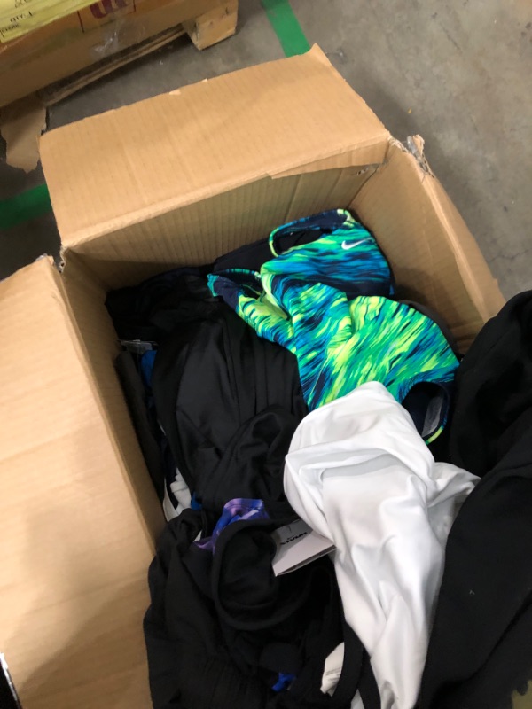 Photo 3 of large box of womens and mens assorted workout clothing all sizes