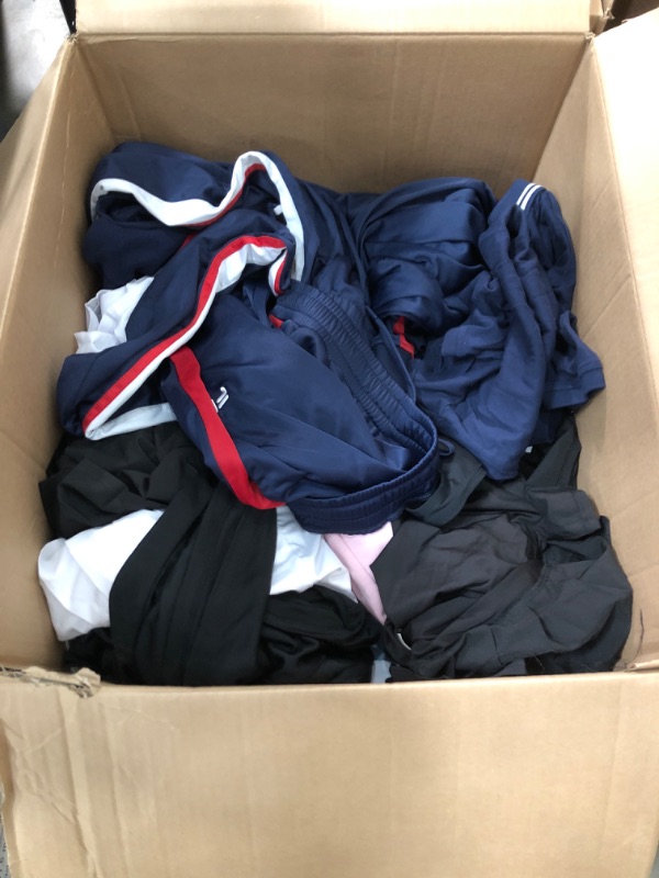 Photo 1 of large box of assorted women and mens fitness clothing all sizes 