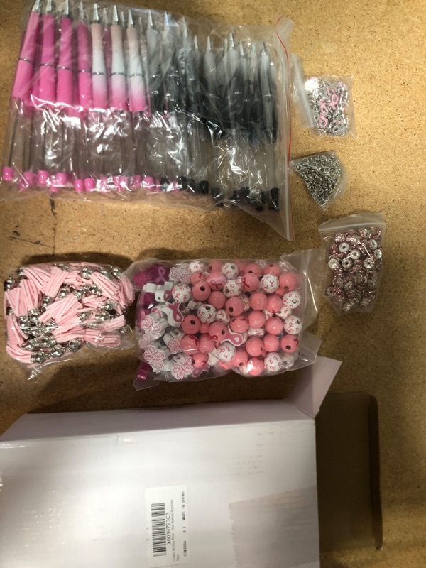 Photo 1 of Colarr 60 Pcs Pink Ribbon Beadable Pen Breast Cancer Awareness Bulk Items Plastic Beadable Pens Breast Cancer Pens DIY Pens Making Kit DIY Beaded Pen for Students Women Girls Office School Supplies Pink Classic