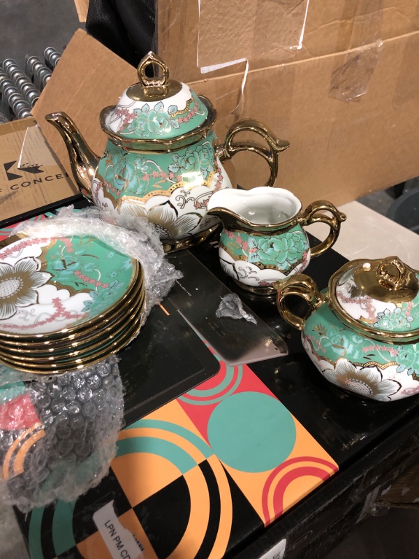Photo 2 of * see clerk notes * 
Suttmin 22 Pcs Christmas Porcelain Adult Tea Set Gift with Metal Holder European Ceramic Tea Set 