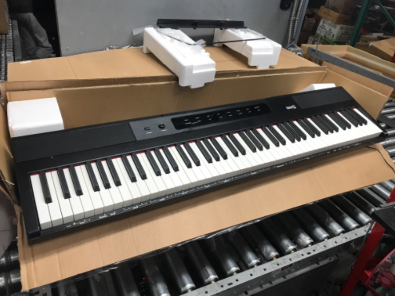 Photo 2 of RockJam 88 Key Digital Piano Keyboard Piano with Full Size Semi-Weighted Keys, Power Supply, Sheet Music Stand, Piano Note Stickers & Simply Piano Lessons 88 Key Digital Piano Piano