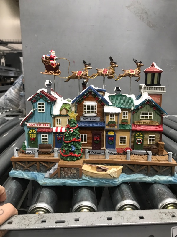 Photo 2 of  Item is completely nonfunctional tested with a cord to another one. Only good for decoration as is.
Carole Towne Ct Skip Pier Lighted Musical Village Scene
