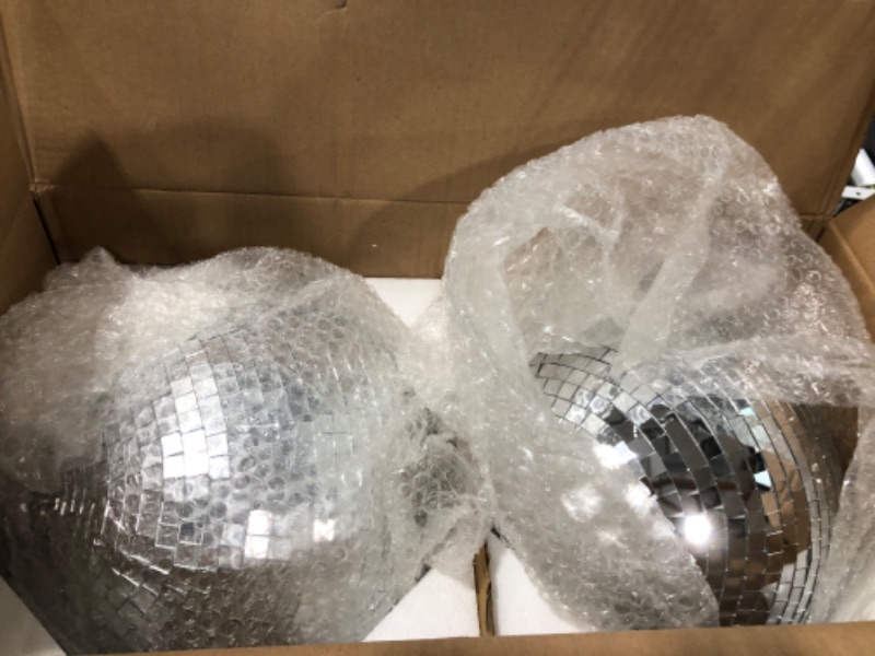 Photo 2 of 2 Pack Large Disco Ball Silver Hanging Mirror Disco Ball Reflective Mirror Disco Ball Ornament for Party Holiday Wedding Dance Music Festivals Decor Club Stage Props DJ Decoration (12 Inch, 12 Inch)