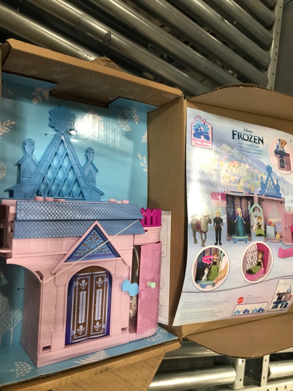 Photo 2 of Disney Frozen Storytime Stackers Playset, Anna's Arendelle Castle Dollhouse with Small Doll, Olaf and 7 Accessories, Inspired by Disney Frozen Movies