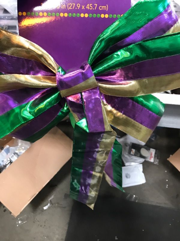 Photo 2 of Amscan Mardi Gras Bow - 11' x 18' | Multicolor | 1 Pc.