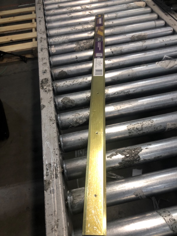 Photo 1 of Anodized Seam Binder with Brass Finish - MD Building Products 06700
