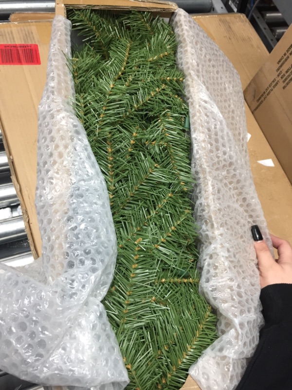 Photo 1 of 18 x 18 prelit clear thin Christmas tree 
