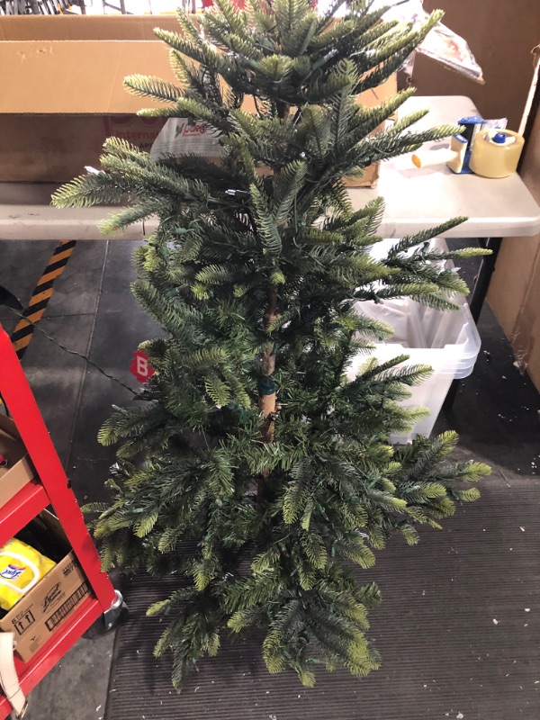 Photo 4 of **LIGHTS DONT WORK**
Puleo International 4.5 Foot Pre-Lit Aspen Fir Artificial Christmas Tree 