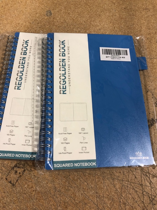 Photo 2 of BUNDLE OF 2 Regolden-Book Undated Spiral Graph Notebook, Medium A5 Squared Notebook, Engineering Math Grid Journal with Pen Holder 160 Pages 5.5x8.5, for Men & Women School/College/Work/Office/Business (Bule) Blue(5.5"*8.5") Grid