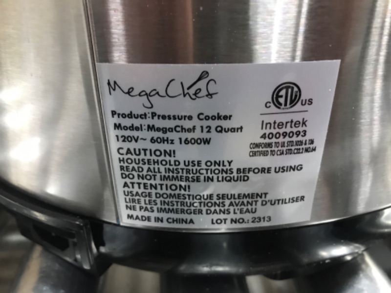 Photo 4 of *****DAMAGED LID, AND HAS DENTS************
MegaChef 12 Quart Digital Pressure Cooker with 15 Preset Options and Glass Lid, Silver
