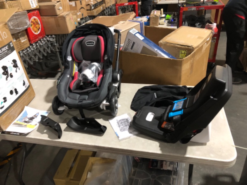 Photo 2 of ***USED - POSSIBLY MISSING PARTS***
Evenflo Shyft DualRide Infant Car Seat and Stroller Combo with Carryall Storage (Sylva Pink)