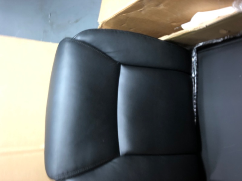 Photo 1 of Amazon Basics Classic Puresoft PU Padded Mid-Back Office Computer Desk Chair with Armrest, 25.75"D x 24.25"W x 42.25"H, Black