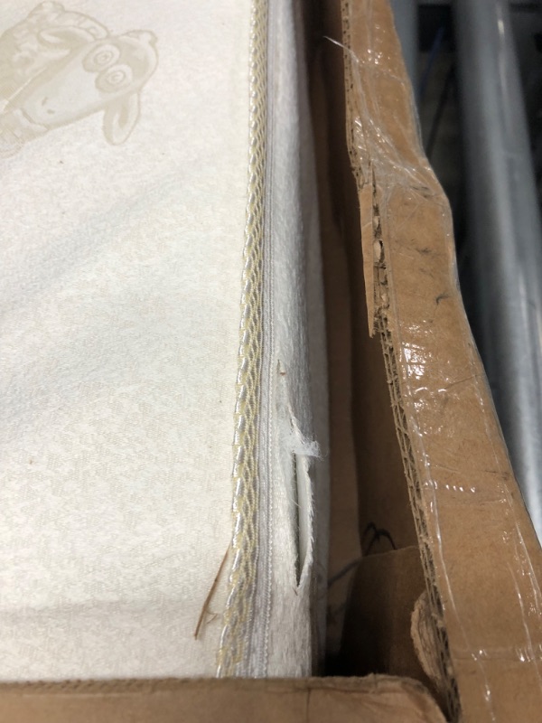 Photo 2 of **DAMAGE**Serta infant toddler mattress