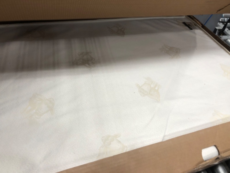 Photo 1 of **DAMAGE**Serta infant toddler mattress