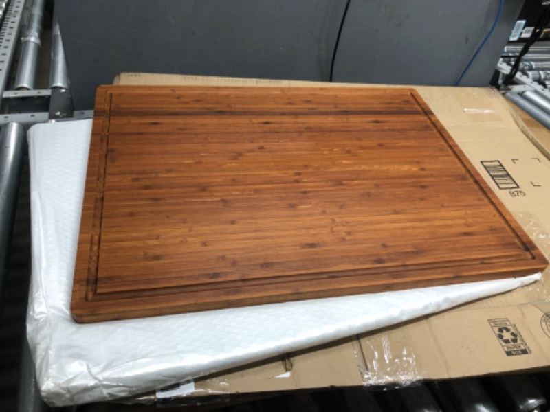 Photo 2 of 24"x18" Bamboo Cutting Boards, XXL Charcuterie Cheese Platter Serving Tray with Handles and Juice Grooves, Solid Structure, Slim, Durable, Reversible 24" x 18" x 0.75"