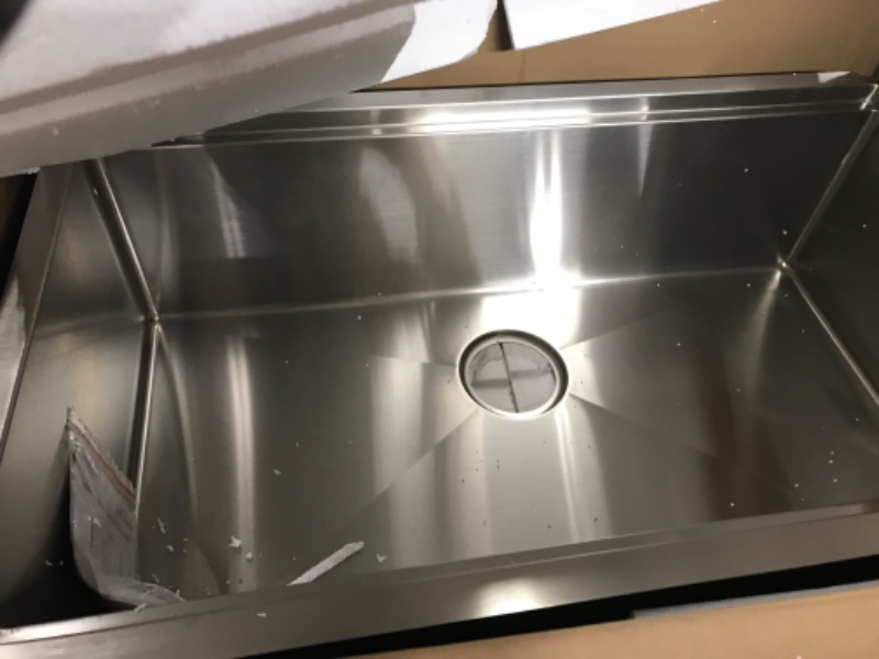 Photo 2 of ***NOT FUNCTIONAL - FOR PARTS - NONREFUNDBALE - SEE COMMENTS***
Ruvati 32-inch Workstation Ledge Undermount 16 Gauge Stainless Steel Kitchen Sink RVH8300 32 x 19 inch