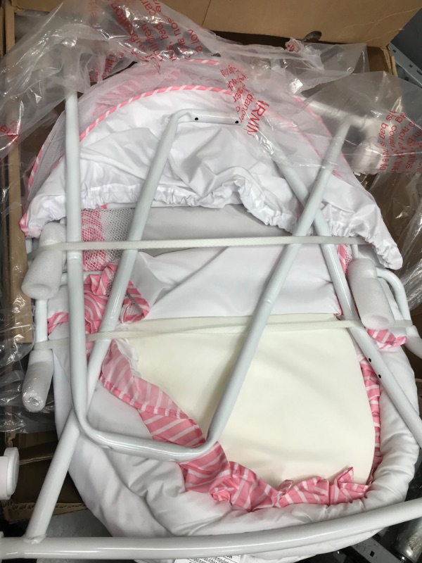 Photo 2 of 
Dream On Me Lacy Portable 2-in-1 Bassinet & Cradle in Pink and White, Lightweight Baby Bassinet with Storage Basket, Adjustable and Removable Canopy
Color:Pink/White