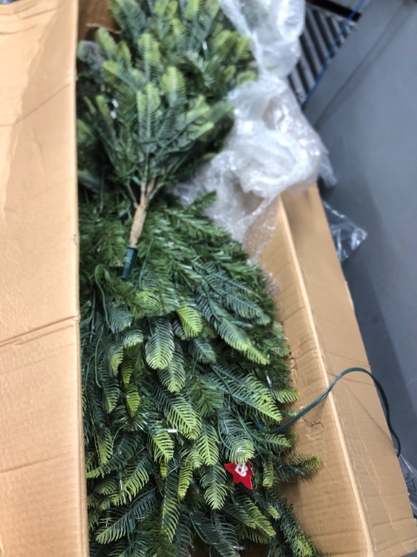 Photo 3 of ***USED - POSSIBLY MISSING PARTS - SOAKED IN WATER***
Puleo International 6.5 Foot Pre-Lit Aspen Fir Artificial Christmas Tree with 500 UL Listed Clear Lights