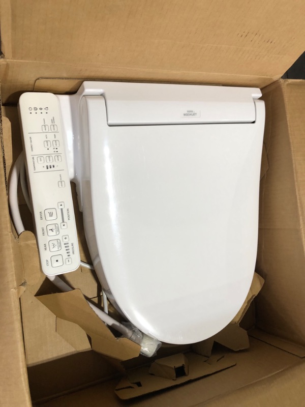 Photo 6 of ***USED - SCRATCHED - POWERS ON - UNABLE TO TEST FURTHER***
TOTO SW3023#01 WASHLET KC2 Round Electronic Bidet Toilet Seat, Cotton White KC2