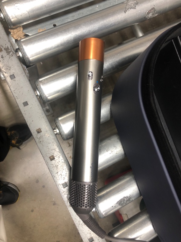 Photo 1 of **SEE NOTES/NONREFUNDABLE FOR PARTS**
Dyson Airwrap™ Multi-styler Complete Long, Nickel/Copper