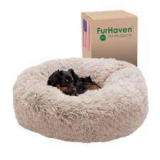 Photo 1 of Furhaven 30" Round Calming Donut Dog Bed for Medium/Small Dogs, Refillable w/ Removable Washable Cover, For Dogs Up to 45 lbs - Shaggy Plush Long Faux Fur Donut Bed - Taupe, Medium