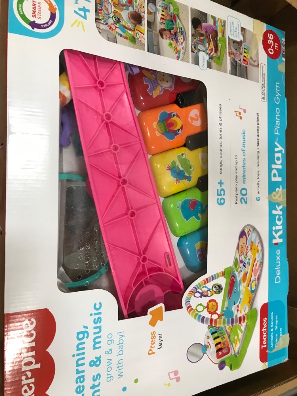 Photo 2 of Fisher-Price Deluxe Kick & Play Piano Gym