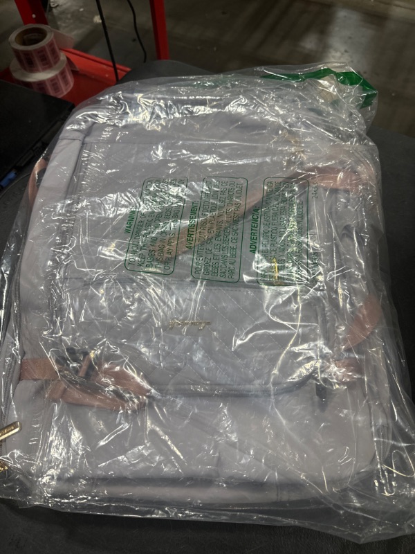 Photo 1 of LOVEVOOK Travel Backpack,Quilted Expandable Carry On Backpack Flight Approved with Toiletry Bag,Large Laptop Backpack Women Waterproof Backpack Fit 17.3 Inch with USB Charging Port Shoes Compartment Silver Gray 17.3 Inch