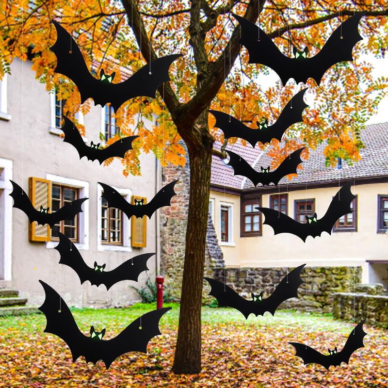 Photo 1 of 21pcs Halloween Hanging Bats Large Flying Bats Outdoor Decorations Fake Black Bats with Glow in the Dark Eyes for Halloween Outside Tree Yard Porch Decor Supplies