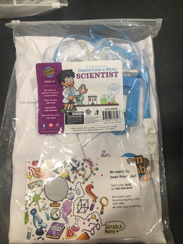 View 2 of Learn & Climb Scientist Lab Coat for Kids Ages 3-7. Three Piece Set Children's Scientist Costume with Goggles & ID Card