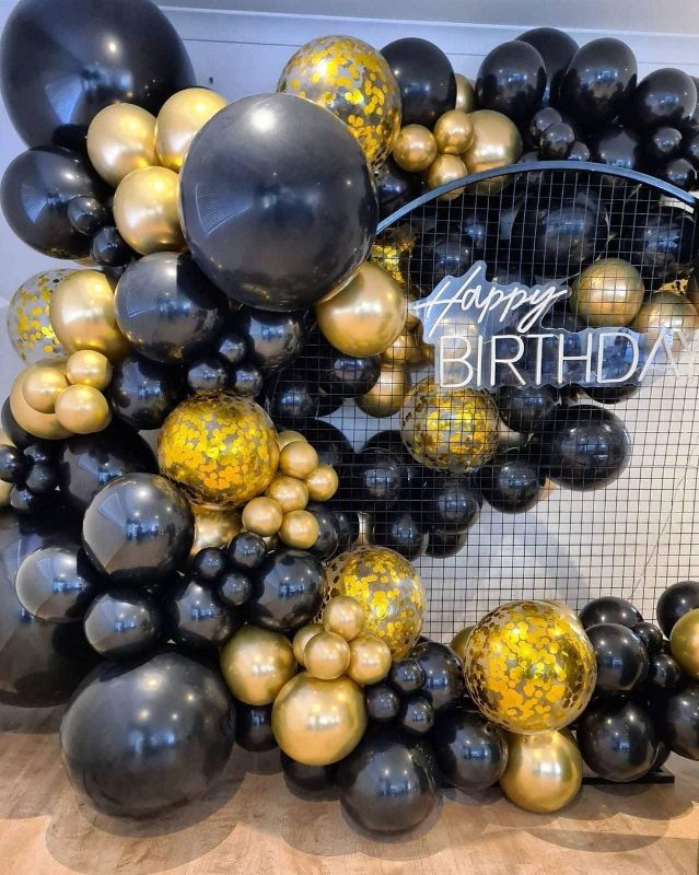 Photo 1 of 128PCS Black and Gold Balloons Garland Kit, 18" 12" 10" 5" Black Balloons, Metallic Gold Balloons, Gold Confetti Balloons Black and Gold Party Decorations for Birthday, New Year 