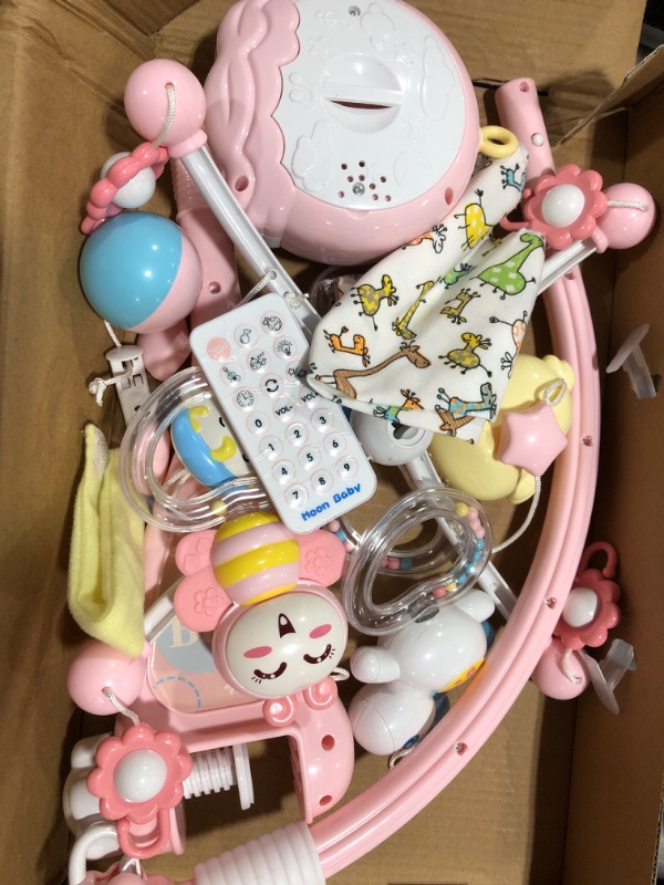 Photo 2 of BOBXIN Baby Musical Crib Mobile with Projector and Night Light,150 Music,Timing Function,Take Along Mobile Music Box and Rattle,Gift for Toddles(with Bibs) pink