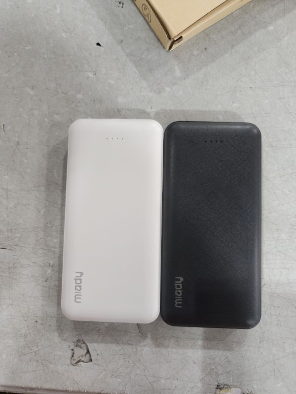 Photo 1 of  Miady 10000mAh Dual USB Portable Charger, Fast Charging Power Bank with USB C Input, Backup Charger for iPhone X, Galaxy S9, Pixel 3 and etc … Black+White