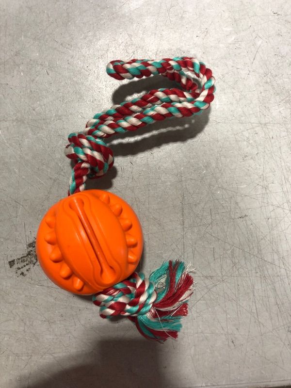 Photo 2 of Ball on Rope Dog Toy - Rubber Ball for Dog, Fetch and Chew Toy, Reward and Exercise Toy, Tug of War Dog Toy Small and Medium Breed Orange-Tug balls