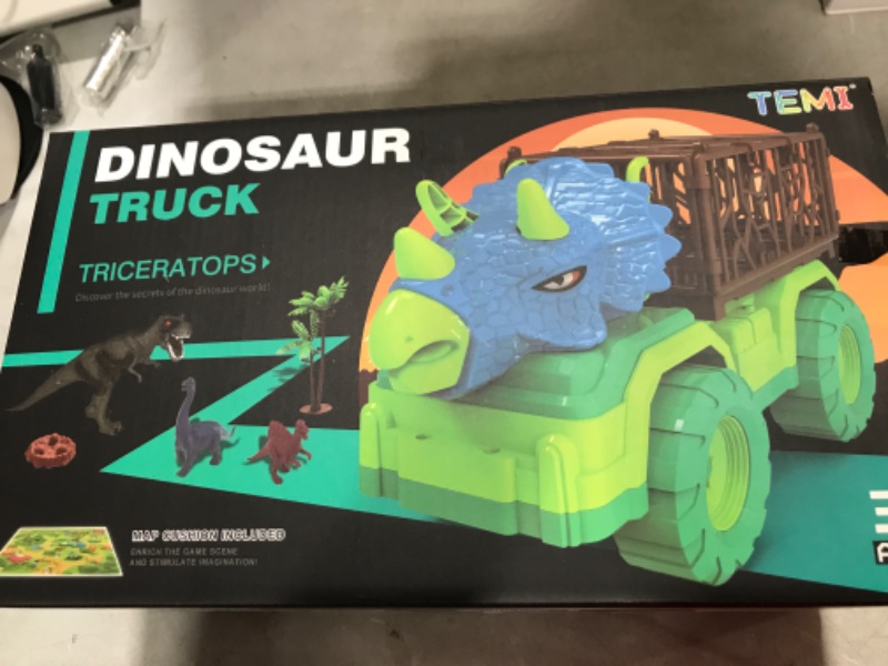 Photo 2 of Dinosaur Transport Truck Toy Play Set for Toddlers, Triceratops Cage Vehicle Carrier Car Toys for Kids 3 4 5 6 7 Years, Monster Truck with 8 Dino Figures & Play Mat, Gift for Boys and Girls Triceratops Dino Truck