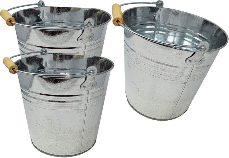 Photo 1 of 
Large 2 Gallon Metal Bucket (3 Pack) Pail Tins Silver W/Wood Handle for Gifts Basket, Ice, Beer or Candy – 10” top x 9” h x 7.5” Bottom
