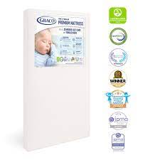 Photo 1 of DIRTY FROM SHIP/STORAGE Graco® Premium Foam Crib and Toddler Mattress
