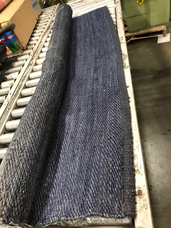 Photo 1 of 5' x 7 navy blue area rug 